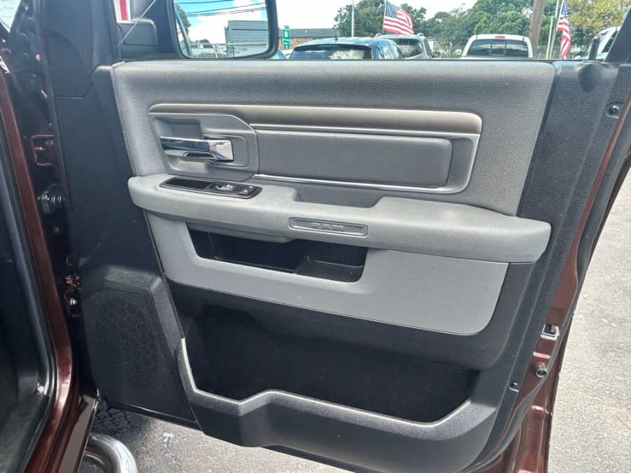 2014 Ram 1500 4WD Quad Cab 140.5" SLT, available for sale in West Babylon, New York | New Gen Auto Group. West Babylon, New York 2014 Ram 1500 4WD Quad Cab 140.5" SLT, available for sale in West Babylon, New York | New Gen Auto Group. West Babylon, New York