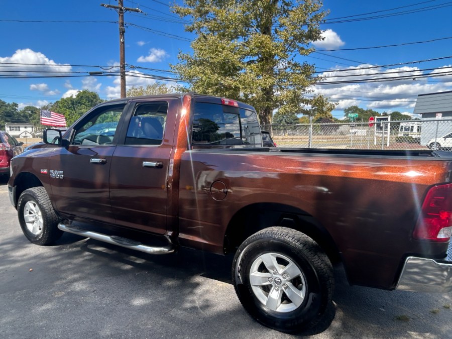 2014 Ram 1500 4WD Quad Cab 140.5" SLT, available for sale in West Babylon, New York | New Gen Auto Group. West Babylon, New York 2014 Ram 1500 4WD Quad Cab 140.5" SLT, available for sale in West Babylon, New York | New Gen Auto Group. West Babylon, New York