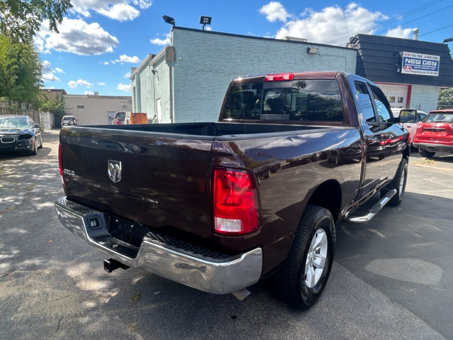2014 Ram 1500 4WD Quad Cab 140.5" SLT, available for sale in West Babylon, New York | New Gen Auto Group. West Babylon, New York 2014 Ram 1500 4WD Quad Cab 140.5" SLT, available for sale in West Babylon, New York | New Gen Auto Group. West Babylon, New York