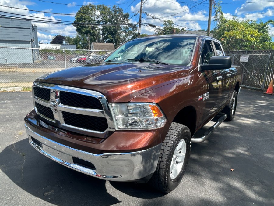 2014 Ram 1500 4WD Quad Cab 140.5" SLT, available for sale in West Babylon, New York | New Gen Auto Group. West Babylon, New York 2014 Ram 1500 4WD Quad Cab 140.5" SLT, available for sale in West Babylon, New York | New Gen Auto Group. West Babylon, New York