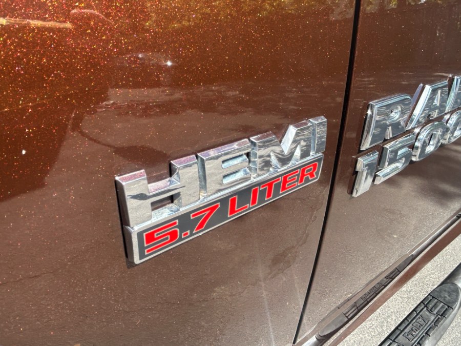 2014 Ram 1500 4WD Quad Cab 140.5" SLT, available for sale in West Babylon, New York | New Gen Auto Group. West Babylon, New York 2014 Ram 1500 4WD Quad Cab 140.5" SLT, available for sale in West Babylon, New York | New Gen Auto Group. West Babylon, New York