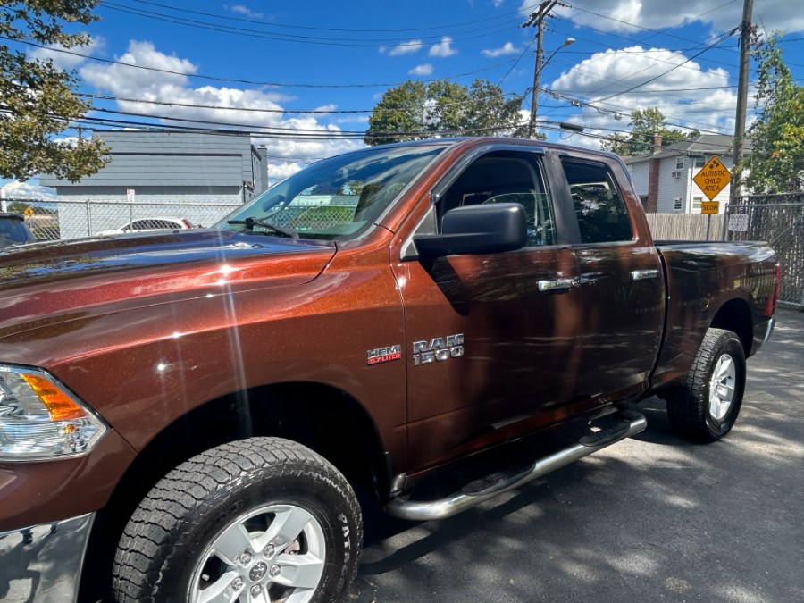 2014 Ram 1500 4WD Quad Cab 140.5" SLT, available for sale in West Babylon, New York | New Gen Auto Group. West Babylon, New York 2014 Ram 1500 4WD Quad Cab 140.5" SLT, available for sale in West Babylon, New York | New Gen Auto Group. West Babylon, New York