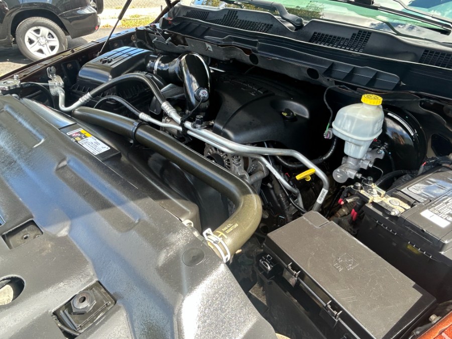 2014 Ram 1500 4WD Quad Cab 140.5" SLT, available for sale in West Babylon, New York | New Gen Auto Group. West Babylon, New York 2014 Ram 1500 4WD Quad Cab 140.5" SLT, available for sale in West Babylon, New York | New Gen Auto Group. West Babylon, New York