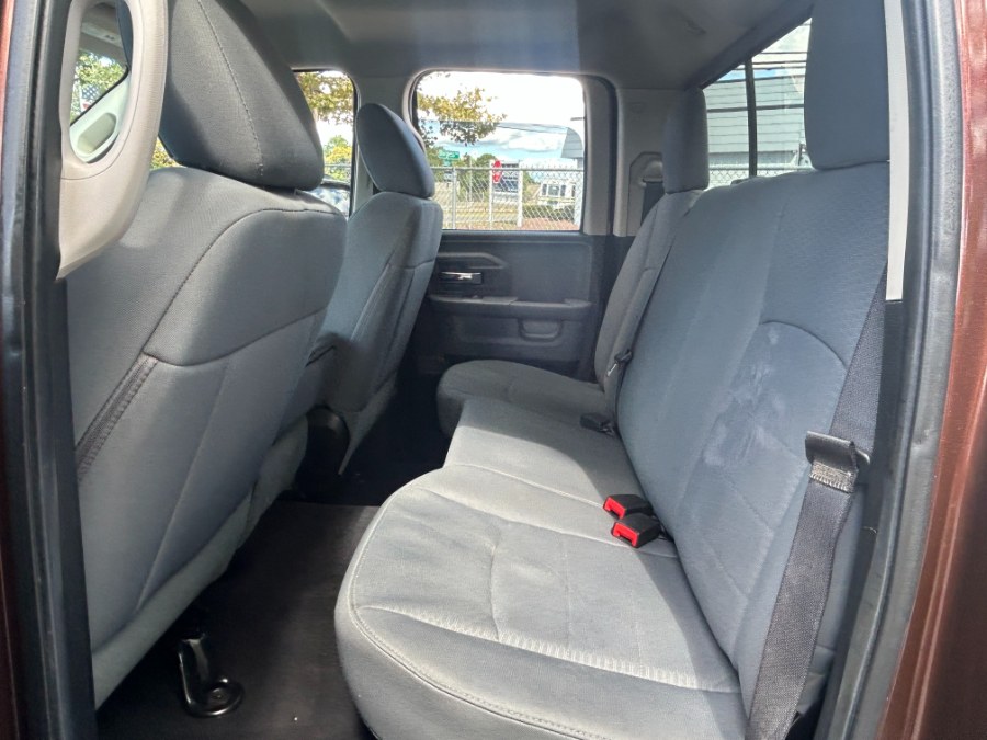 2014 Ram 1500 4WD Quad Cab 140.5" SLT, available for sale in West Babylon, New York | New Gen Auto Group. West Babylon, New York 2014 Ram 1500 4WD Quad Cab 140.5" SLT, available for sale in West Babylon, New York | New Gen Auto Group. West Babylon, New York