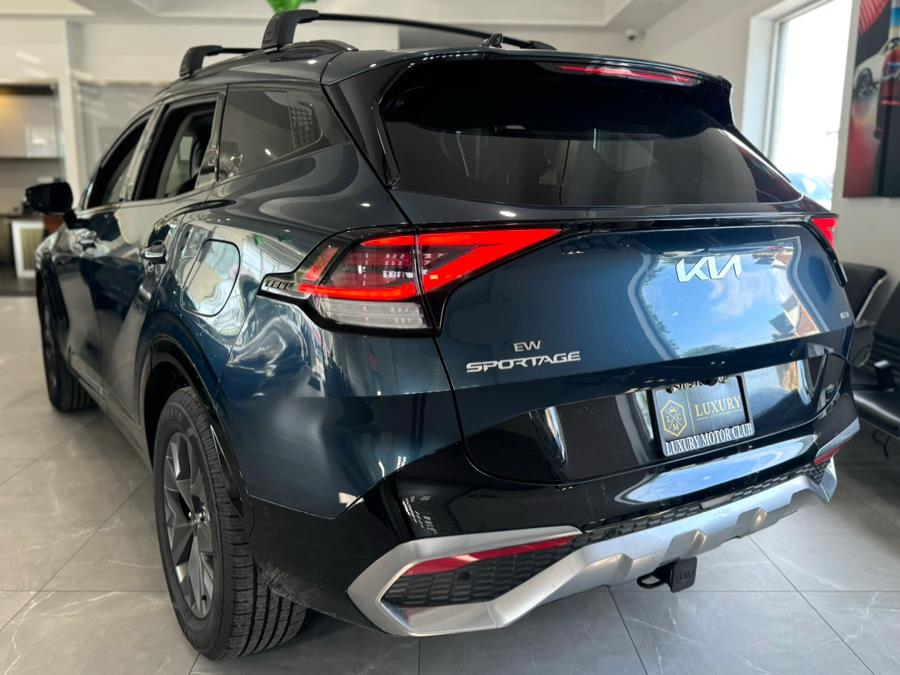2023 Kia Sportage Hybrid SX-Prestige AWD, available for sale in Franklin Square, New York | Luxury Motor Club. Franklin Square, New York 2023 Kia Sportage Hybrid SX-Prestige AWD, available for sale in Franklin Square, New York | Luxury Motor Club. Franklin Square, New York