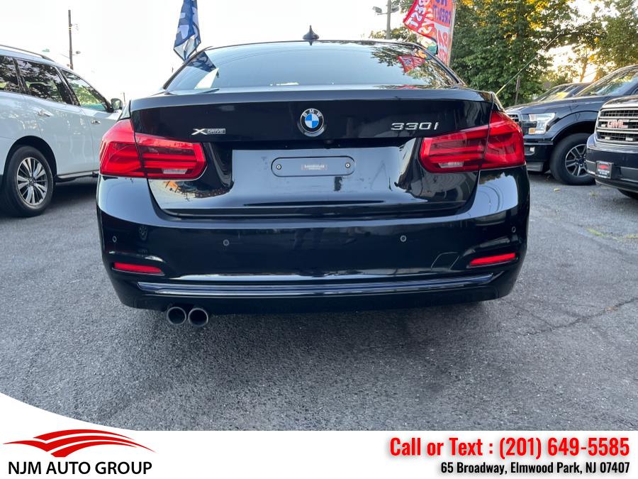 2018 BMW 3 Series 330i xDrive Sedan, available for sale in Elmwood Park, New Jersey | NJM Auto Group. Elmwood Park, New Jersey 2018 BMW 3 Series 330i xDrive Sedan, available for sale in Elmwood Park, New Jersey | NJM Auto Group. Elmwood Park, New Jersey