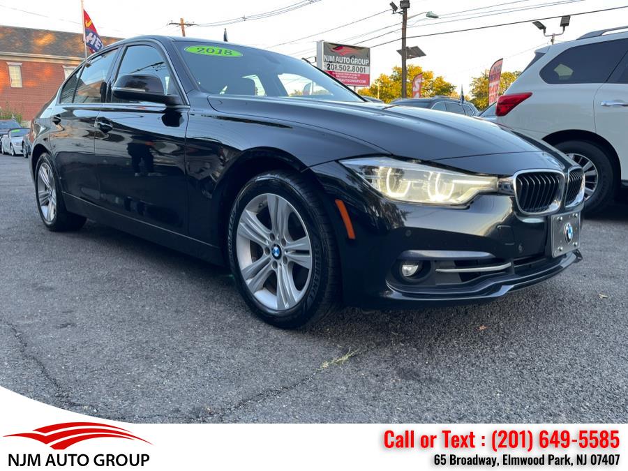 2018 BMW 3 Series 330i xDrive Sedan, available for sale in Elmwood Park, New Jersey | NJM Auto Group. Elmwood Park, New Jersey 2018 BMW 3 Series 330i xDrive Sedan, available for sale in Elmwood Park, New Jersey | NJM Auto Group. Elmwood Park, New Jersey