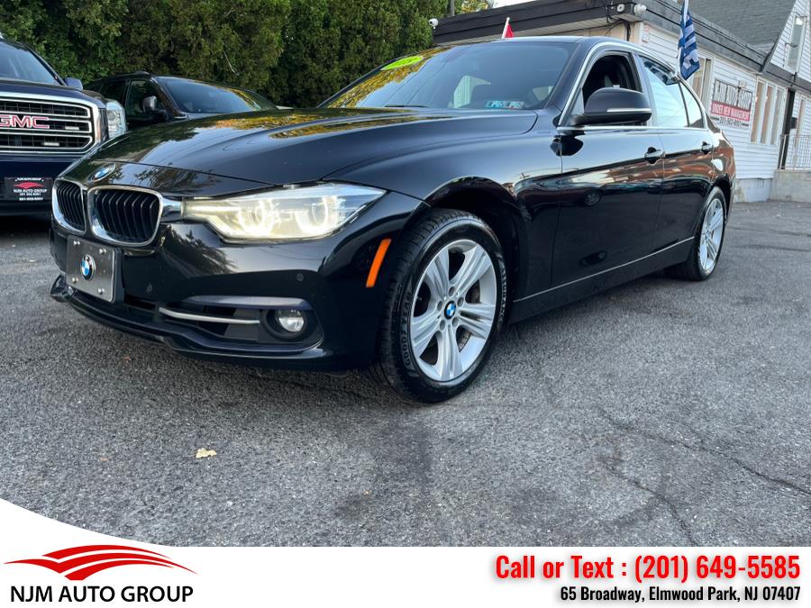2018 BMW 3 Series 330i xDrive Sedan, available for sale in Elmwood Park, New Jersey | NJM Auto Group. Elmwood Park, New Jersey 2018 BMW 3 Series 330i xDrive Sedan, available for sale in Elmwood Park, New Jersey | NJM Auto Group. Elmwood Park, New Jersey