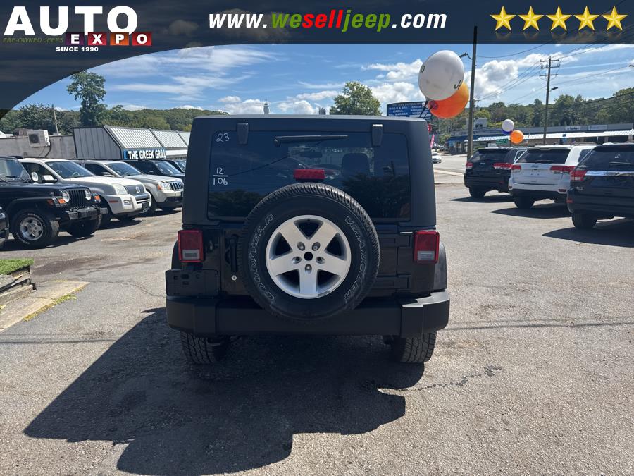 2012 Jeep Wrangler 4WD 2dr Sport, available for sale in Huntington, New York | Auto Expo. Huntington, New York 2012 Jeep Wrangler 4WD 2dr Sport, available for sale in Huntington, New York | Auto Expo. Huntington, New York