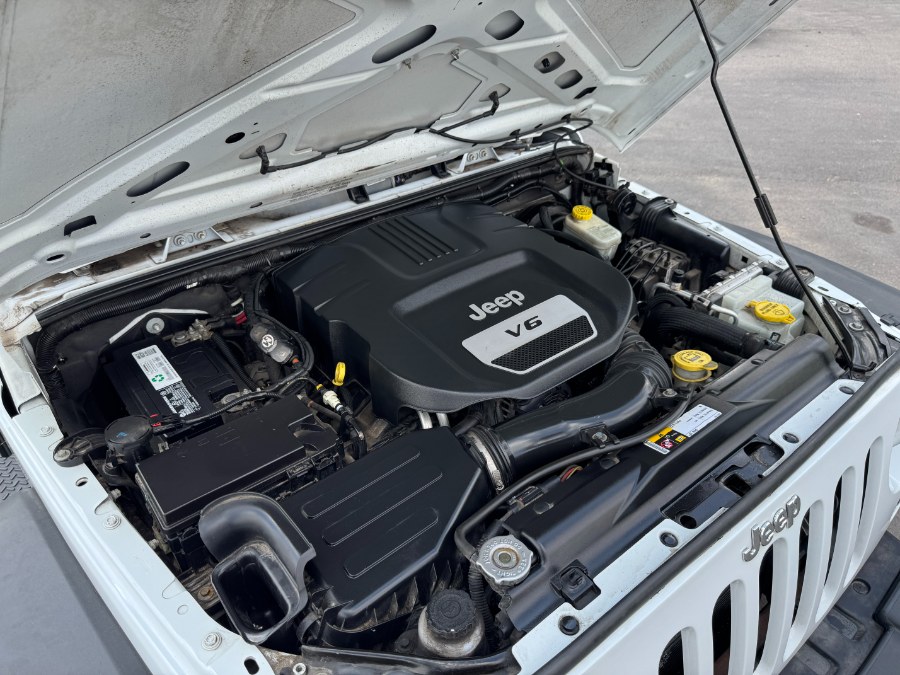 2014 Jeep Wrangler Unlimited 4WD 4dr Sport, available for sale in Ortonville, Michigan | Marsh Auto Sales LLC. Ortonville, Michigan 2014 Jeep Wrangler Unlimited 4WD 4dr Sport, available for sale in Ortonville, Michigan | Marsh Auto Sales LLC. Ortonville, Michigan