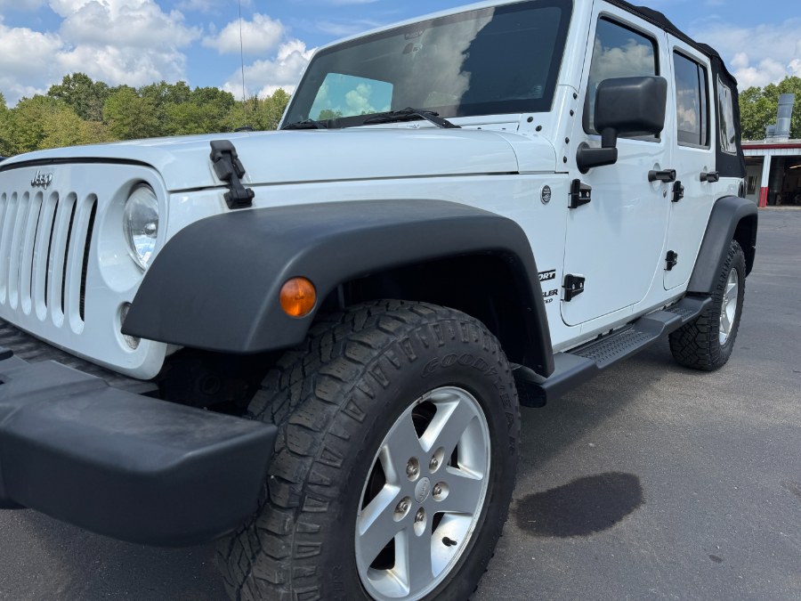 2014 Jeep Wrangler Unlimited 4WD 4dr Sport, available for sale in Ortonville, Michigan | Marsh Auto Sales LLC. Ortonville, Michigan 2014 Jeep Wrangler Unlimited 4WD 4dr Sport, available for sale in Ortonville, Michigan | Marsh Auto Sales LLC. Ortonville, Michigan