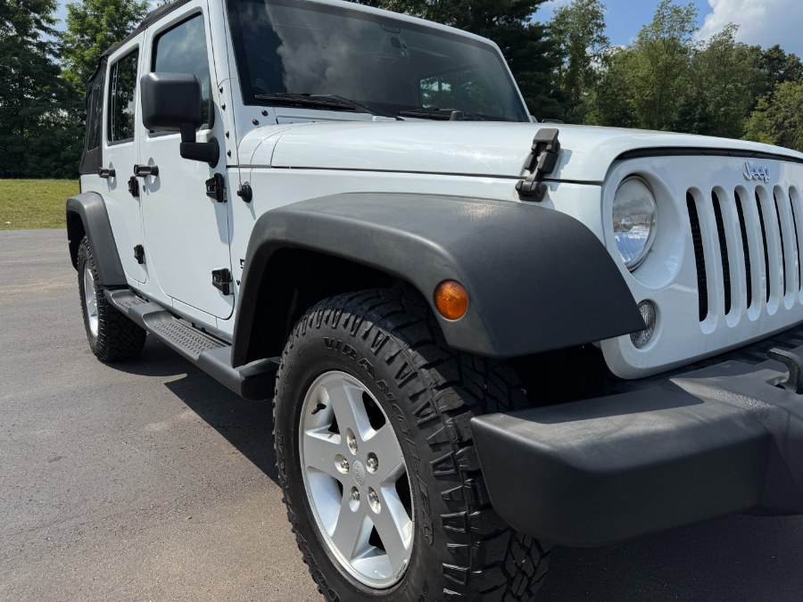 2014 Jeep Wrangler Unlimited 4WD 4dr Sport, available for sale in Ortonville, Michigan | Marsh Auto Sales LLC. Ortonville, Michigan 2014 Jeep Wrangler Unlimited 4WD 4dr Sport, available for sale in Ortonville, Michigan | Marsh Auto Sales LLC. Ortonville, Michigan