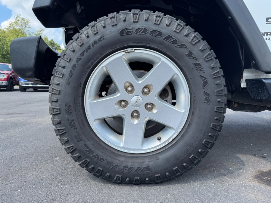 2014 Jeep Wrangler Unlimited 4WD 4dr Sport, available for sale in Ortonville, Michigan | Marsh Auto Sales LLC. Ortonville, Michigan 2014 Jeep Wrangler Unlimited 4WD 4dr Sport, available for sale in Ortonville, Michigan | Marsh Auto Sales LLC. Ortonville, Michigan