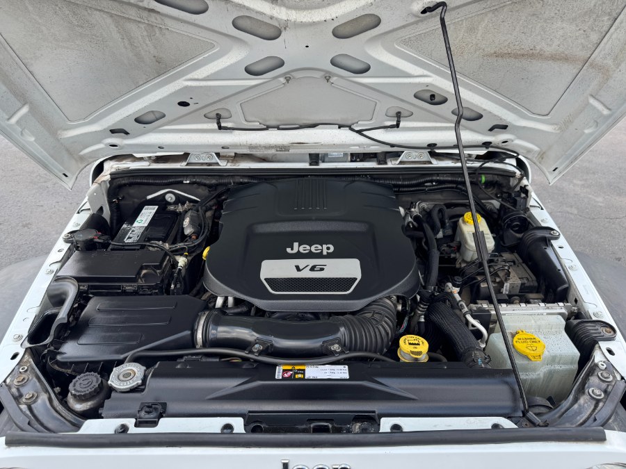 2014 Jeep Wrangler Unlimited 4WD 4dr Sport, available for sale in Ortonville, Michigan | Marsh Auto Sales LLC. Ortonville, Michigan 2014 Jeep Wrangler Unlimited 4WD 4dr Sport, available for sale in Ortonville, Michigan | Marsh Auto Sales LLC. Ortonville, Michigan