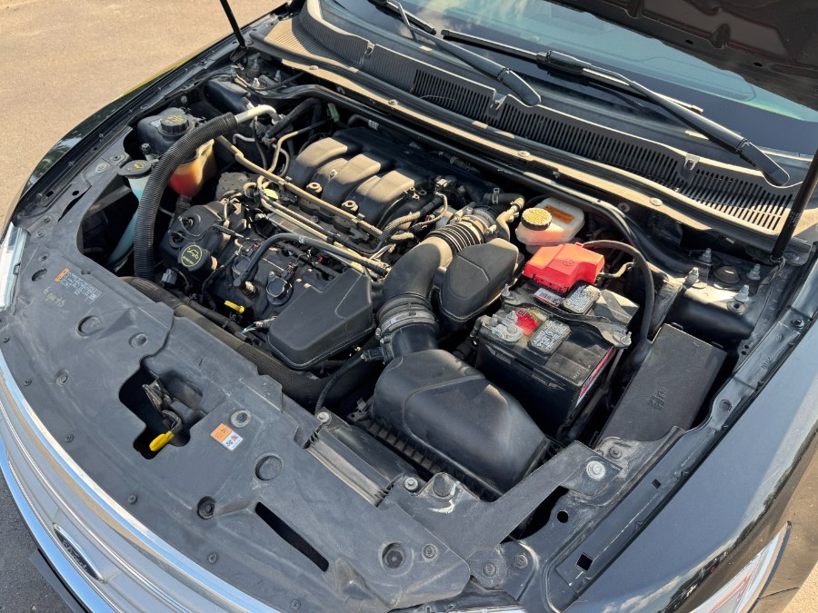 2014 Ford Taurus 4dr Sdn SEL FWD, available for sale in Ortonville, Michigan | Marsh Auto Sales LLC. Ortonville, Michigan 2014 Ford Taurus 4dr Sdn SEL FWD, available for sale in Ortonville, Michigan | Marsh Auto Sales LLC. Ortonville, Michigan