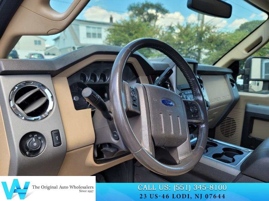 2014 Ford Super Duty F-250 SRW 4WD Crew Cab 172" Lariat, available for sale in Lodi, New Jersey | AW Auto & Truck Wholesalers, Inc. Lodi, New Jersey 2014 Ford Super Duty F-250 SRW 4WD Crew Cab 172" Lariat, available for sale in Lodi, New Jersey | AW Auto & Truck Wholesalers, Inc. Lodi, New Jersey