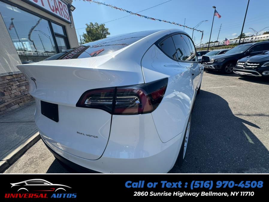 2020 Tesla Model Y Long Range AWD, available for sale in Bellmore, New York | Universal Autos. Bellmore, New York 2020 Tesla Model Y Long Range AWD, available for sale in Bellmore, New York | Universal Autos. Bellmore, New York