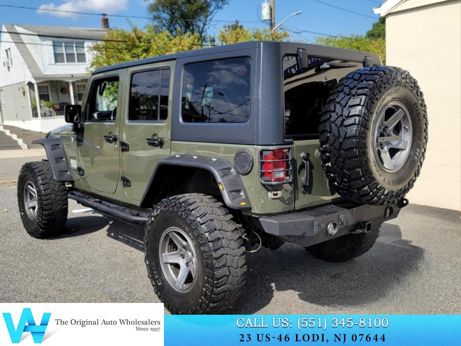 2015 Jeep Wrangler Unlimited 4WD 4dr Sport, available for sale in Lodi, New Jersey | AW Auto & Truck Wholesalers, Inc. Lodi, New Jersey 2015 Jeep Wrangler Unlimited 4WD 4dr Sport, available for sale in Lodi, New Jersey | AW Auto & Truck Wholesalers, Inc. Lodi, New Jersey