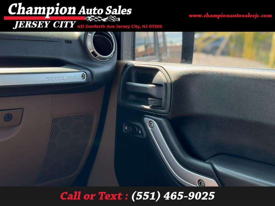 2013 Jeep Wrangler Unlimited 4WD 4dr Sahara, available for sale in Jersey City, New Jersey | Champion Auto Sales. Jersey City, New Jersey 2013 Jeep Wrangler Unlimited 4WD 4dr Sahara, available for sale in Jersey City, New Jersey | Champion Auto Sales. Jersey City, New Jersey