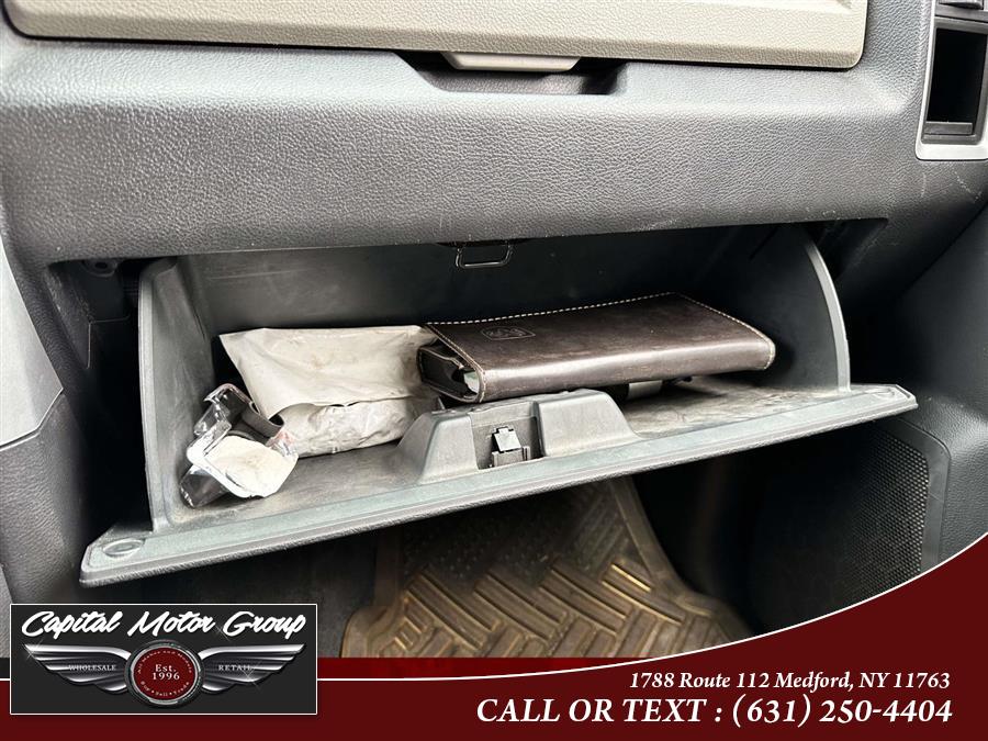 2012 Ram 1500 4WD Crew Cab 140.5" Big Horn, available for sale in Medford, New York | Capital Motor Group Inc. Medford, New York 2012 Ram 1500 4WD Crew Cab 140.5" Big Horn, available for sale in Medford, New York | Capital Motor Group Inc. Medford, New York