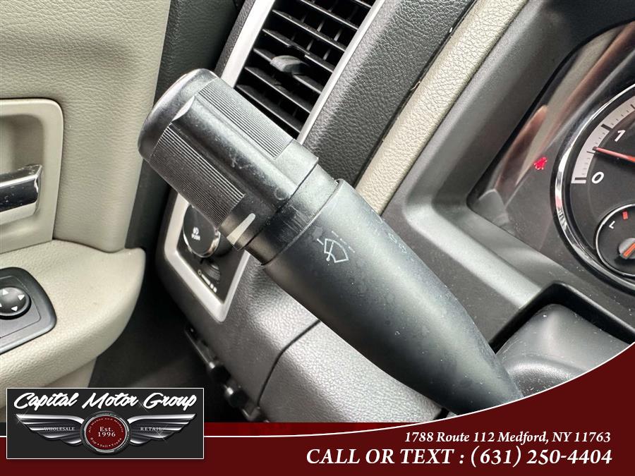 2012 Ram 1500 4WD Crew Cab 140.5" Big Horn, available for sale in Medford, New York | Capital Motor Group Inc. Medford, New York 2012 Ram 1500 4WD Crew Cab 140.5" Big Horn, available for sale in Medford, New York | Capital Motor Group Inc. Medford, New York