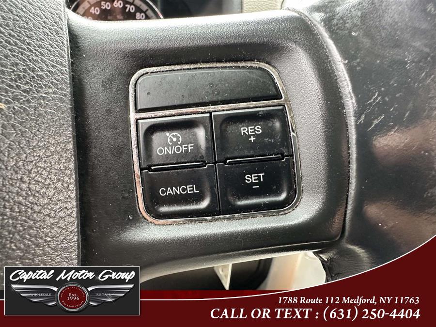 2012 Ram 1500 4WD Crew Cab 140.5" Big Horn, available for sale in Medford, New York | Capital Motor Group Inc. Medford, New York 2012 Ram 1500 4WD Crew Cab 140.5" Big Horn, available for sale in Medford, New York | Capital Motor Group Inc. Medford, New York