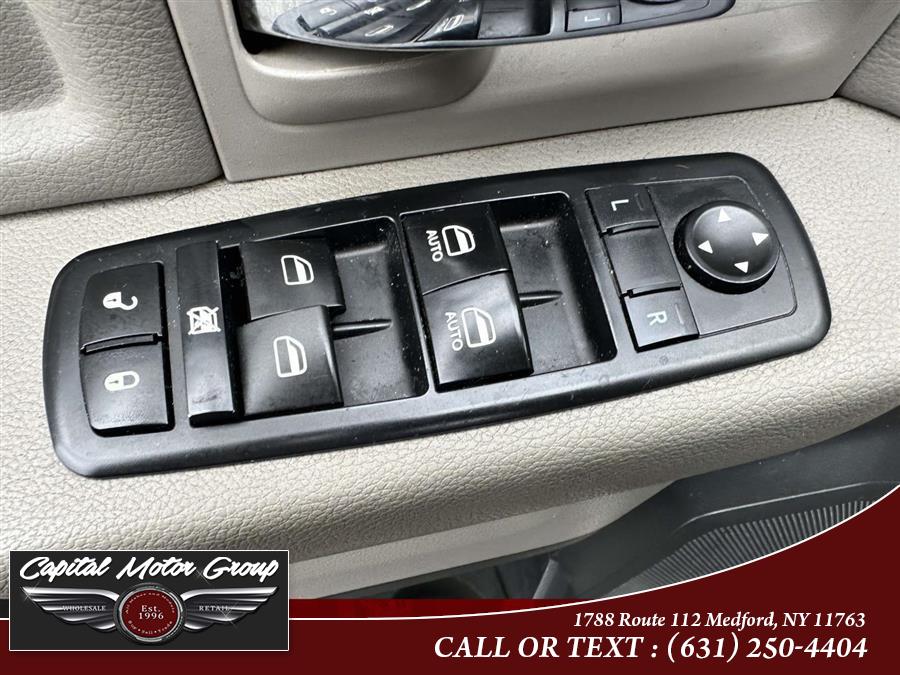 2012 Ram 1500 4WD Crew Cab 140.5" Big Horn, available for sale in Medford, New York | Capital Motor Group Inc. Medford, New York 2012 Ram 1500 4WD Crew Cab 140.5" Big Horn, available for sale in Medford, New York | Capital Motor Group Inc. Medford, New York