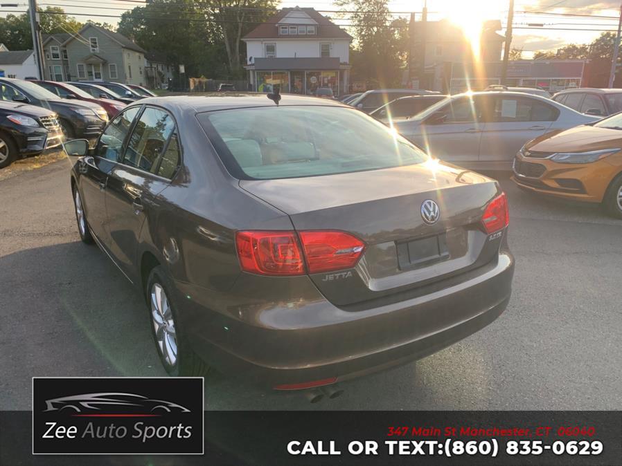 2011 Volkswagen Jetta Sedan 4dr Auto SE w/Convenience & Sunroof PZEV, available for sale in Manchester, Connecticut | Zee Auto Sports. Manchester, Connecticut 2011 Volkswagen Jetta Sedan 4dr Auto SE w/Convenience & Sunroof PZEV, available for sale in Manchester, Connecticut | Zee Auto Sports. Manchester, Connecticut