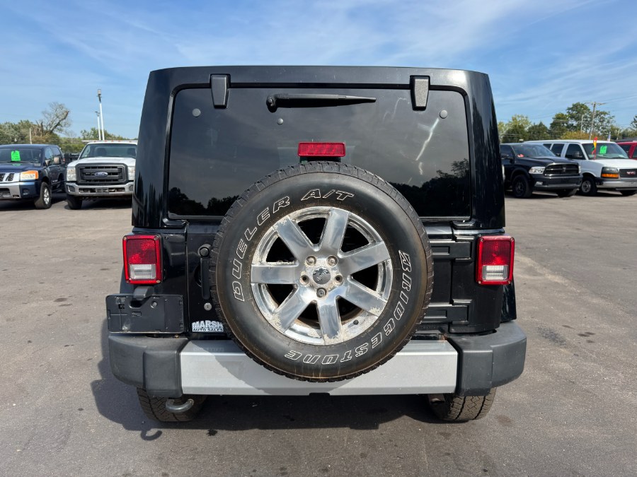 2015 Jeep Wrangler Unlimited 4WD 4dr Sahara, available for sale in Ortonville, Michigan | Marsh Auto Sales LLC. Ortonville, Michigan 2015 Jeep Wrangler Unlimited 4WD 4dr Sahara, available for sale in Ortonville, Michigan | Marsh Auto Sales LLC. Ortonville, Michigan