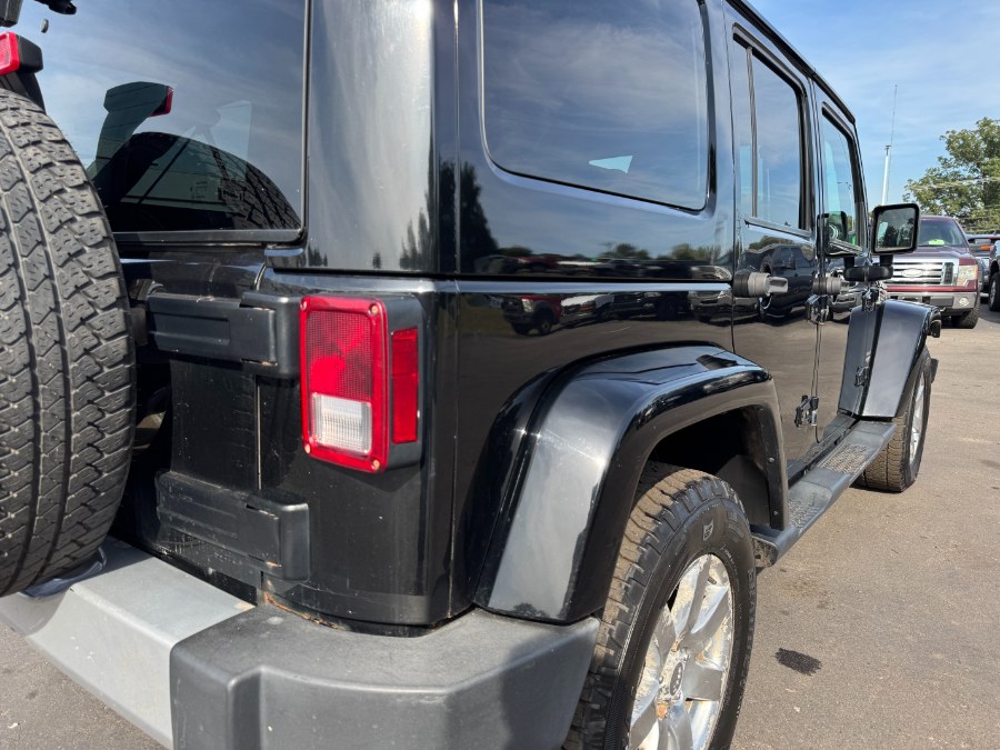 2015 Jeep Wrangler Unlimited 4WD 4dr Sahara, available for sale in Ortonville, Michigan | Marsh Auto Sales LLC. Ortonville, Michigan 2015 Jeep Wrangler Unlimited 4WD 4dr Sahara, available for sale in Ortonville, Michigan | Marsh Auto Sales LLC. Ortonville, Michigan