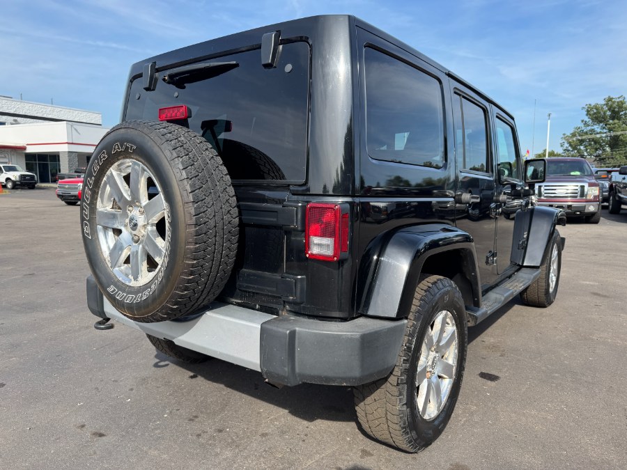 2015 Jeep Wrangler Unlimited 4WD 4dr Sahara, available for sale in Ortonville, Michigan | Marsh Auto Sales LLC. Ortonville, Michigan 2015 Jeep Wrangler Unlimited 4WD 4dr Sahara, available for sale in Ortonville, Michigan | Marsh Auto Sales LLC. Ortonville, Michigan