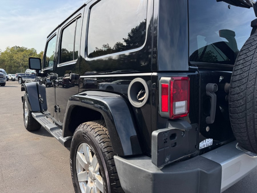 2015 Jeep Wrangler Unlimited 4WD 4dr Sahara, available for sale in Ortonville, Michigan | Marsh Auto Sales LLC. Ortonville, Michigan 2015 Jeep Wrangler Unlimited 4WD 4dr Sahara, available for sale in Ortonville, Michigan | Marsh Auto Sales LLC. Ortonville, Michigan