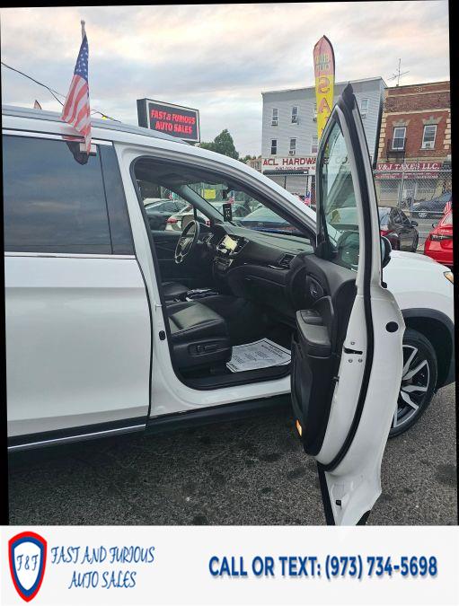 2022 Honda Pilot Touring Sport Utility 4D, available for sale in Newark, New Jersey | Fast and Furious Auto Sales. Newark, New Jersey 2022 Honda Pilot Touring Sport Utility 4D, available for sale in Newark, New Jersey | Fast and Furious Auto Sales. Newark, New Jersey