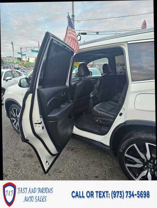2022 Honda Pilot Touring Sport Utility 4D, available for sale in Newark, New Jersey | Fast and Furious Auto Sales. Newark, New Jersey 2022 Honda Pilot Touring Sport Utility 4D, available for sale in Newark, New Jersey | Fast and Furious Auto Sales. Newark, New Jersey