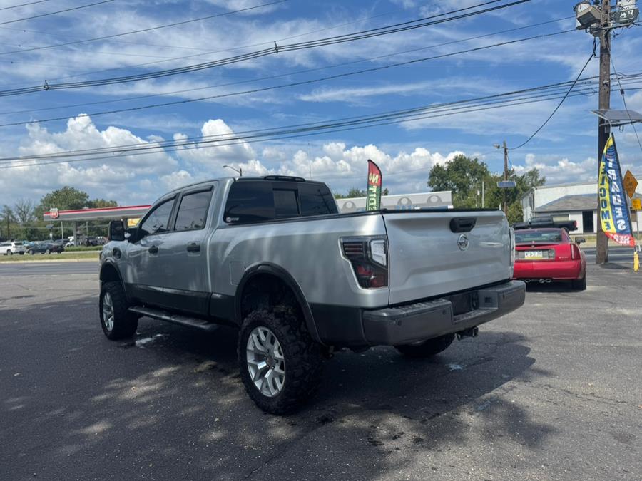 2016 Nissan Titan XD 4WD Crew Cab PRO-4X Diesel, available for sale in BURLINGTON, New Jersey | Tri States Auto Group. BURLINGTON, New Jersey 2016 Nissan Titan XD 4WD Crew Cab PRO-4X Diesel, available for sale in BURLINGTON, New Jersey | Tri States Auto Group. BURLINGTON, New Jersey