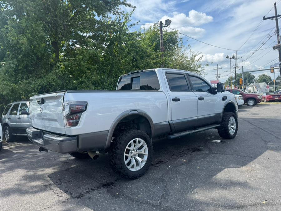 2016 Nissan Titan XD 4WD Crew Cab PRO-4X Diesel, available for sale in BURLINGTON, New Jersey | Tri States Auto Group. BURLINGTON, New Jersey 2016 Nissan Titan XD 4WD Crew Cab PRO-4X Diesel, available for sale in BURLINGTON, New Jersey | Tri States Auto Group. BURLINGTON, New Jersey