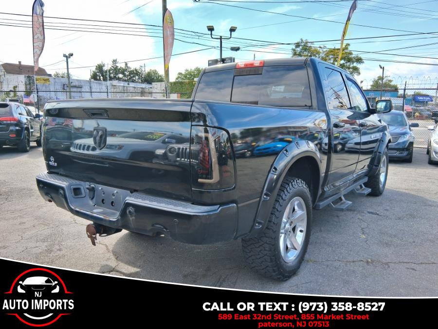 2011 Ram 1500 4WD Crew Cab 140.5" Sport, available for sale in Paterson, New Jersey | NJ Auto Imports. Paterson, New Jersey 2011 Ram 1500 4WD Crew Cab 140.5" Sport, available for sale in Paterson, New Jersey | NJ Auto Imports. Paterson, New Jersey