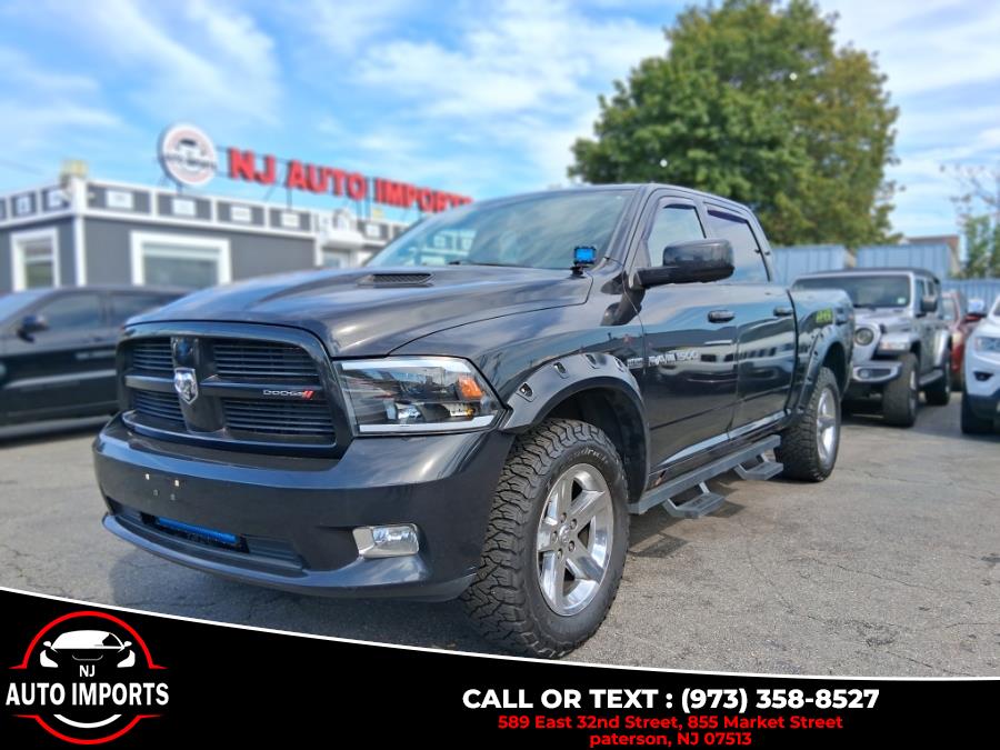2011 Ram 1500 4WD Crew Cab 140.5" Sport, available for sale in Paterson, New Jersey | NJ Auto Imports. Paterson, New Jersey 2011 Ram 1500 4WD Crew Cab 140.5" Sport, available for sale in Paterson, New Jersey | NJ Auto Imports. Paterson, New Jersey
