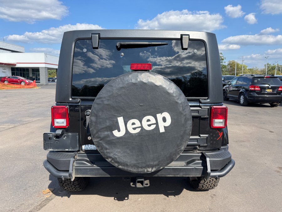 2016 Jeep Wrangler Unlimited 4WD 4dr Sahara, available for sale in Ortonville, Michigan | Marsh Auto Sales LLC. Ortonville, Michigan 2016 Jeep Wrangler Unlimited 4WD 4dr Sahara, available for sale in Ortonville, Michigan | Marsh Auto Sales LLC. Ortonville, Michigan
