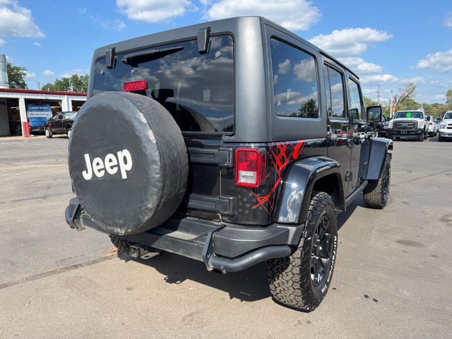 2016 Jeep Wrangler Unlimited 4WD 4dr Sahara, available for sale in Ortonville, Michigan | Marsh Auto Sales LLC. Ortonville, Michigan 2016 Jeep Wrangler Unlimited 4WD 4dr Sahara, available for sale in Ortonville, Michigan | Marsh Auto Sales LLC. Ortonville, Michigan