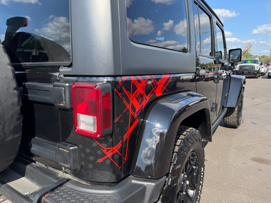 2016 Jeep Wrangler Unlimited 4WD 4dr Sahara, available for sale in Ortonville, Michigan | Marsh Auto Sales LLC. Ortonville, Michigan 2016 Jeep Wrangler Unlimited 4WD 4dr Sahara, available for sale in Ortonville, Michigan | Marsh Auto Sales LLC. Ortonville, Michigan