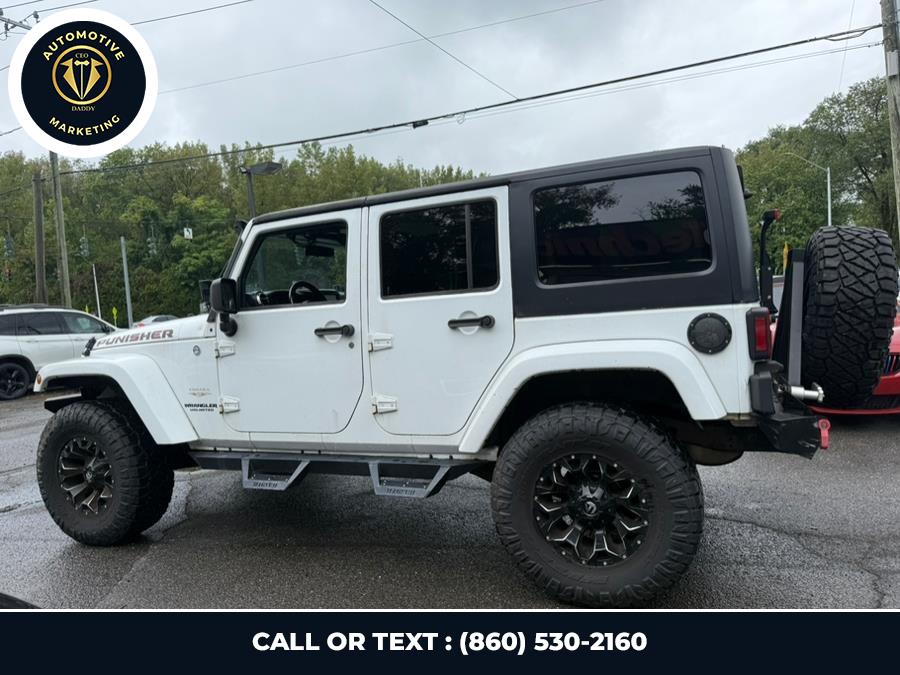 2012 Jeep Wrangler Unlimited 4WD 4dr Sahara, available for sale in Online only, Connecticut | CEO DADDY AUTO. Online only, Connecticut 2012 Jeep Wrangler Unlimited 4WD 4dr Sahara, available for sale in Online only, Connecticut | CEO DADDY AUTO. Online only, Connecticut