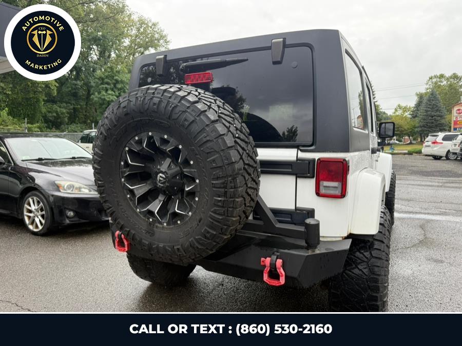 2012 Jeep Wrangler Unlimited 4WD 4dr Sahara, available for sale in Online only, Connecticut | CEO DADDY AUTO. Online only, Connecticut 2012 Jeep Wrangler Unlimited 4WD 4dr Sahara, available for sale in Online only, Connecticut | CEO DADDY AUTO. Online only, Connecticut