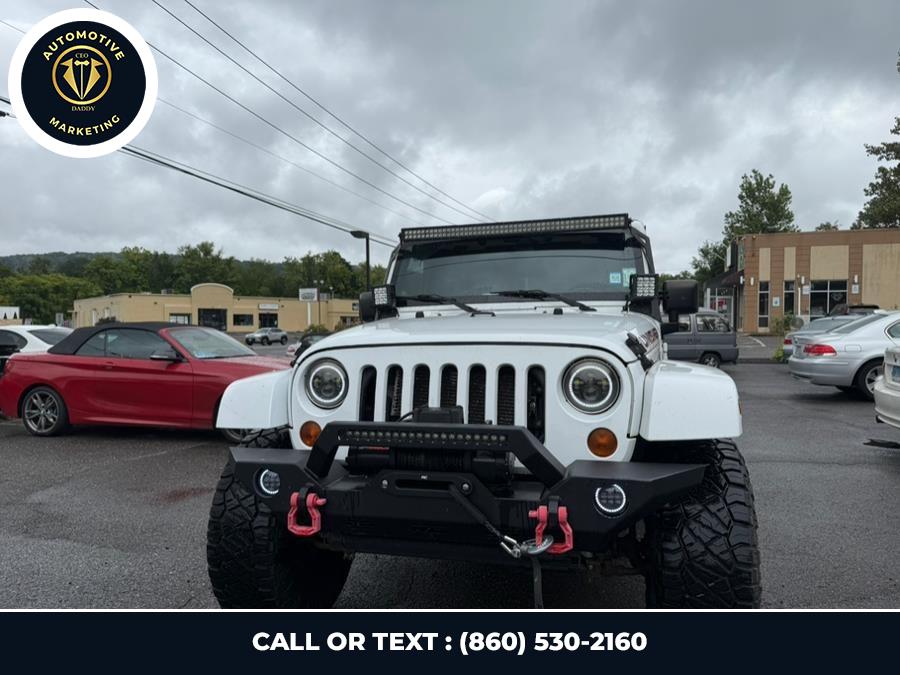 2012 Jeep Wrangler Unlimited 4WD 4dr Sahara, available for sale in Online only, Connecticut | CEO DADDY AUTO. Online only, Connecticut 2012 Jeep Wrangler Unlimited 4WD 4dr Sahara, available for sale in Online only, Connecticut | CEO DADDY AUTO. Online only, Connecticut