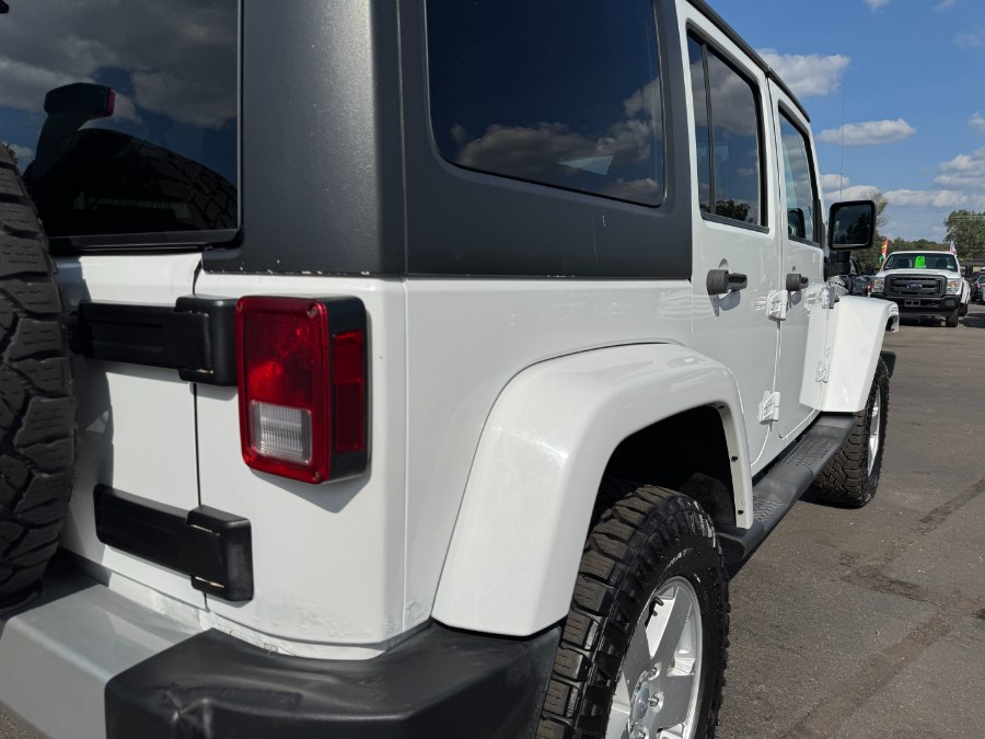 2011 Jeep Wrangler Unlimited 4WD 4dr Sahara, available for sale in Ortonville, Michigan | Marsh Auto Sales LLC. Ortonville, Michigan 2011 Jeep Wrangler Unlimited 4WD 4dr Sahara, available for sale in Ortonville, Michigan | Marsh Auto Sales LLC. Ortonville, Michigan