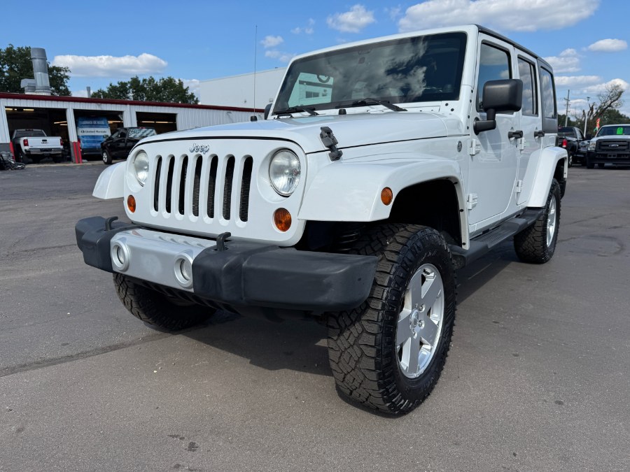 2011 Jeep Wrangler Unlimited 4WD 4dr Sahara, available for sale in Ortonville, Michigan | Marsh Auto Sales LLC. Ortonville, Michigan 2011 Jeep Wrangler Unlimited 4WD 4dr Sahara, available for sale in Ortonville, Michigan | Marsh Auto Sales LLC. Ortonville, Michigan
