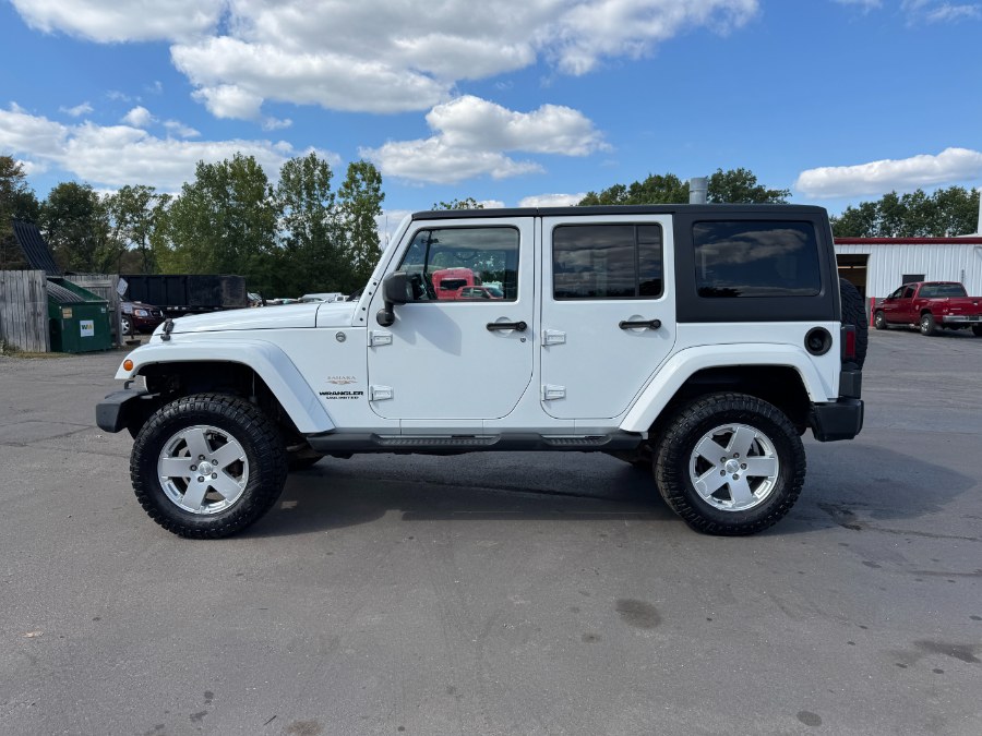 2011 Jeep Wrangler Unlimited 4WD 4dr Sahara, available for sale in Ortonville, Michigan | Marsh Auto Sales LLC. Ortonville, Michigan 2011 Jeep Wrangler Unlimited 4WD 4dr Sahara, available for sale in Ortonville, Michigan | Marsh Auto Sales LLC. Ortonville, Michigan