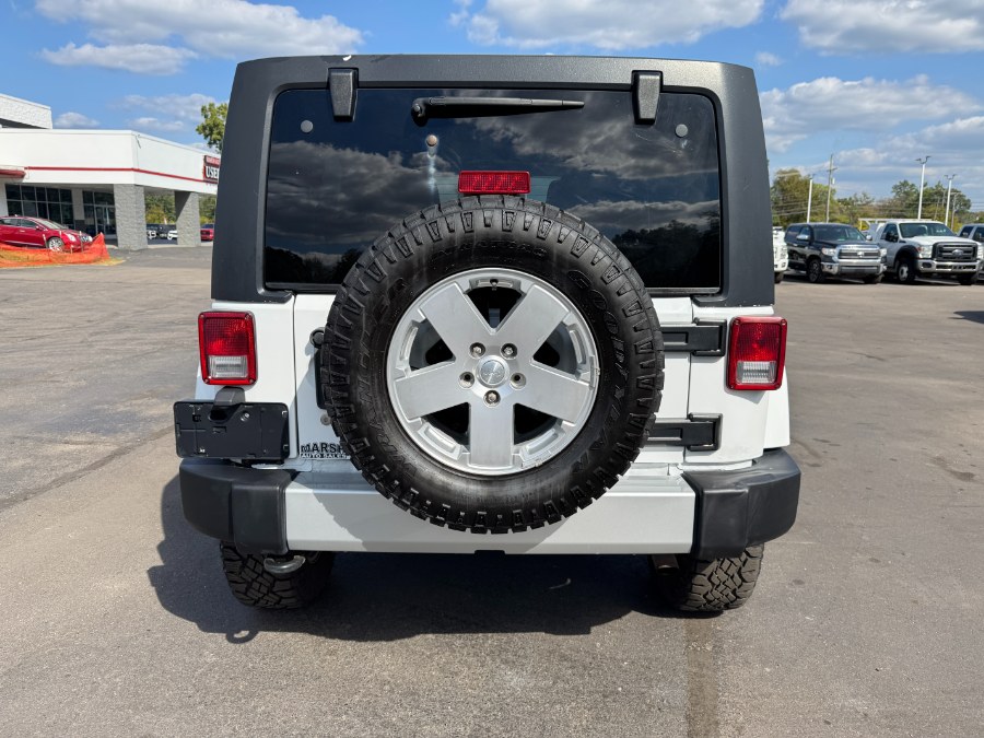 2011 Jeep Wrangler Unlimited 4WD 4dr Sahara, available for sale in Ortonville, Michigan | Marsh Auto Sales LLC. Ortonville, Michigan 2011 Jeep Wrangler Unlimited 4WD 4dr Sahara, available for sale in Ortonville, Michigan | Marsh Auto Sales LLC. Ortonville, Michigan