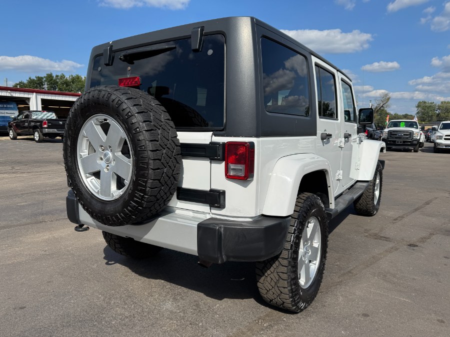 2011 Jeep Wrangler Unlimited 4WD 4dr Sahara, available for sale in Ortonville, Michigan | Marsh Auto Sales LLC. Ortonville, Michigan 2011 Jeep Wrangler Unlimited 4WD 4dr Sahara, available for sale in Ortonville, Michigan | Marsh Auto Sales LLC. Ortonville, Michigan