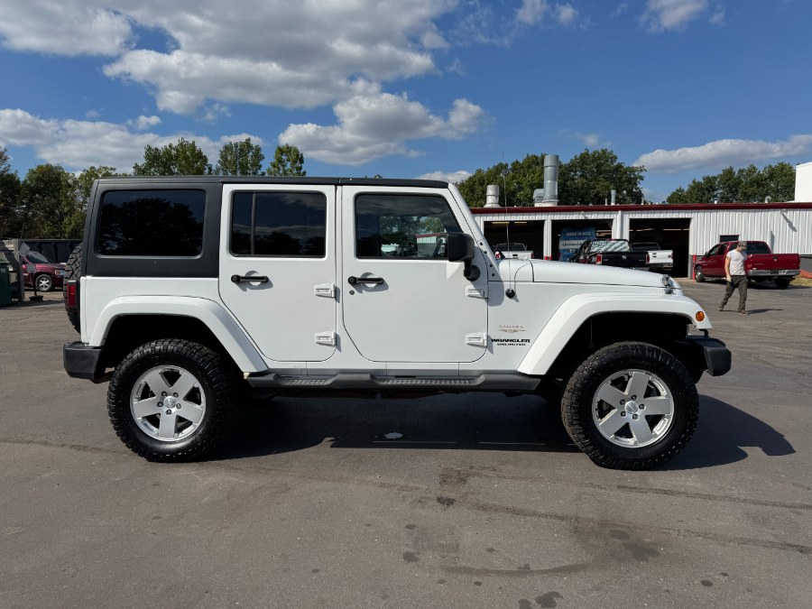 2011 Jeep Wrangler Unlimited 4WD 4dr Sahara, available for sale in Ortonville, Michigan | Marsh Auto Sales LLC. Ortonville, Michigan 2011 Jeep Wrangler Unlimited 4WD 4dr Sahara, available for sale in Ortonville, Michigan | Marsh Auto Sales LLC. Ortonville, Michigan